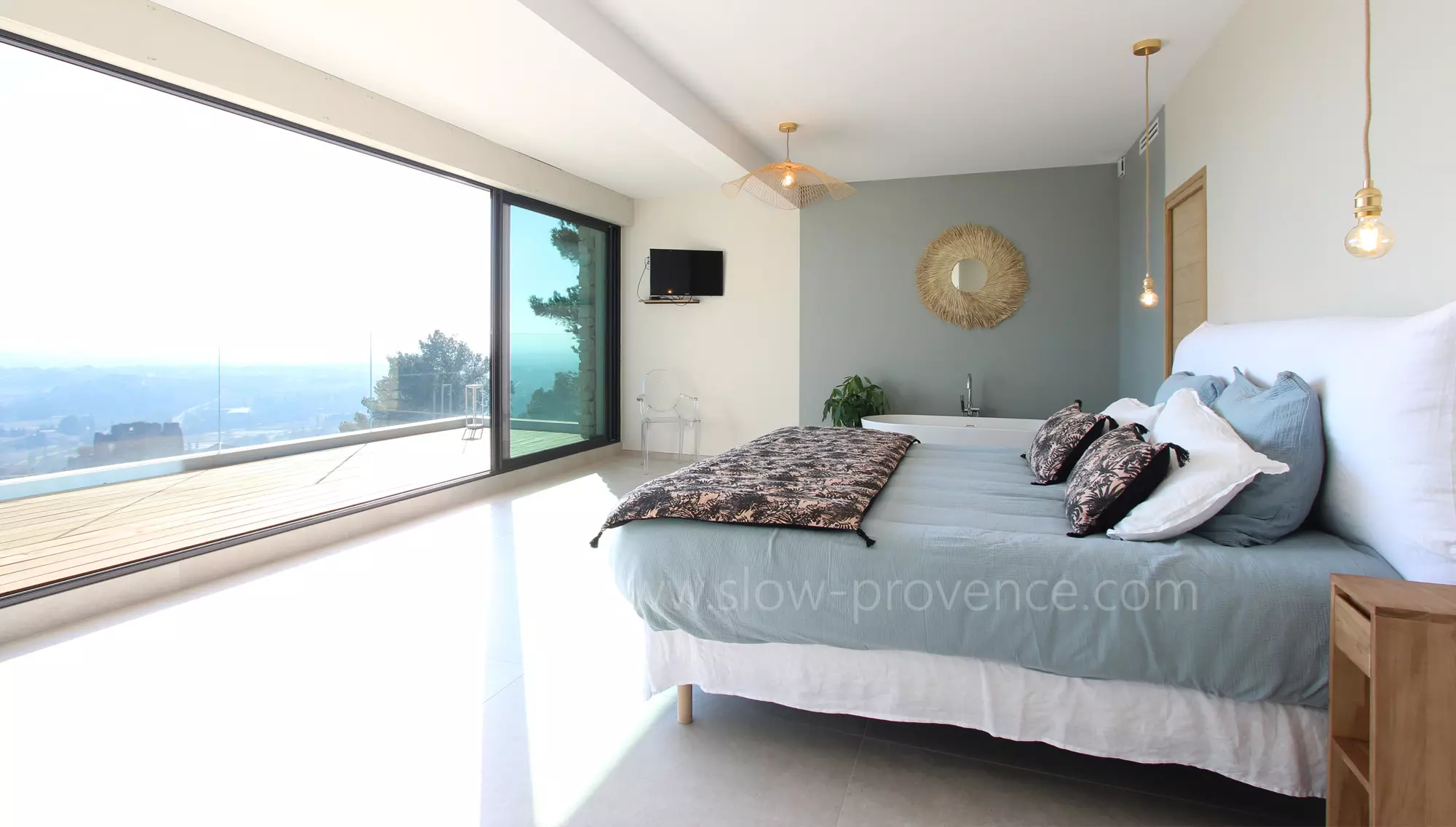 Large bay window overlooking a private terrace