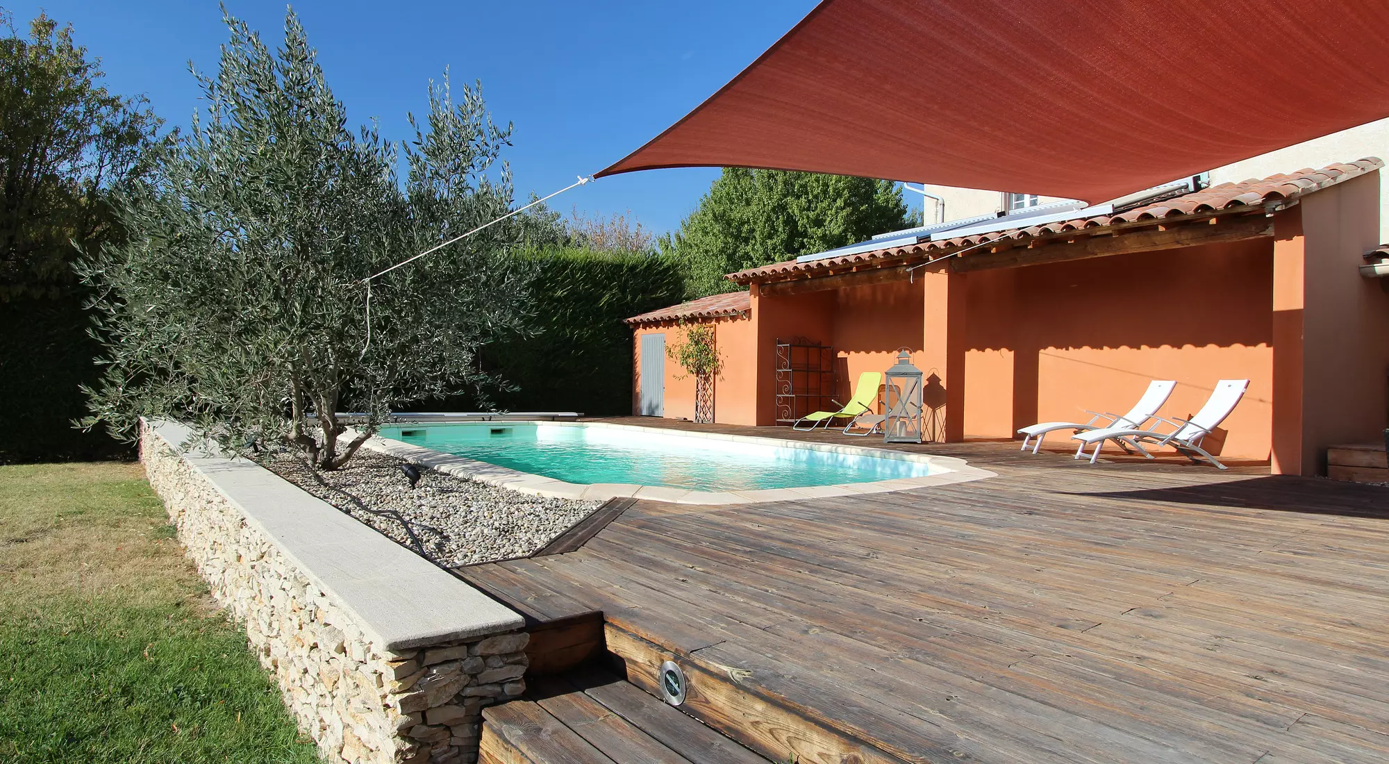 Large teak deck around the pool