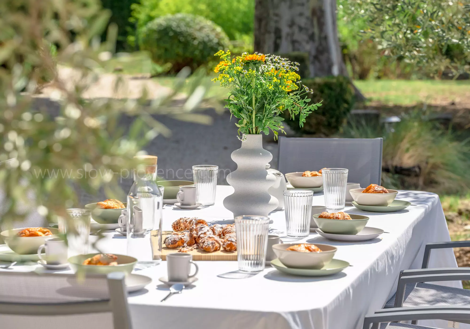 Breakfast in the shade of the olive trees.