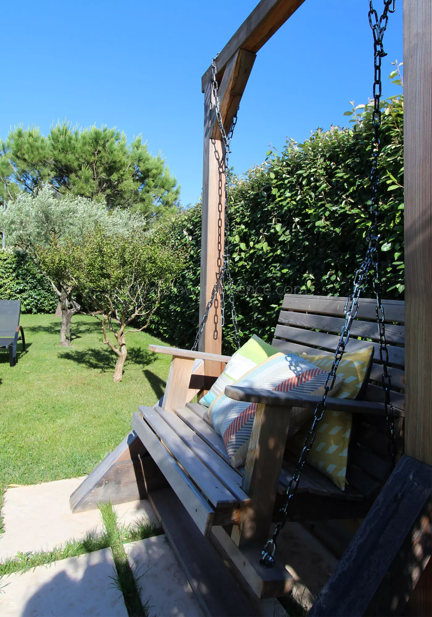 Swing facing the pool