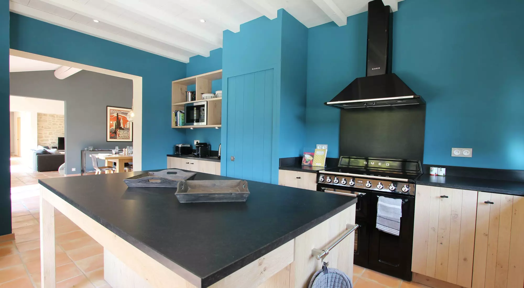 Kitchen with utility room and open to the living room