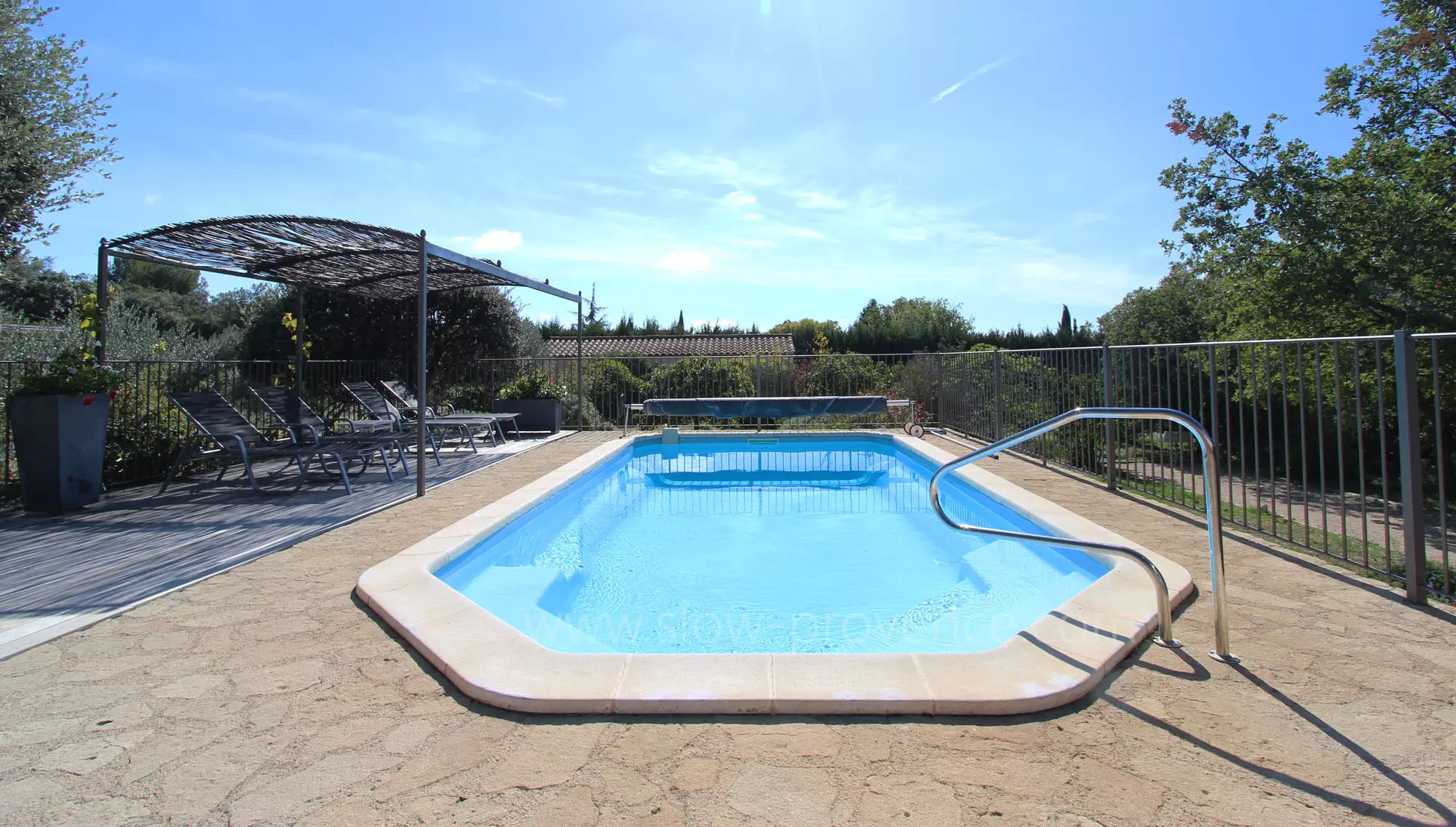 Swimming-pool with shaded area