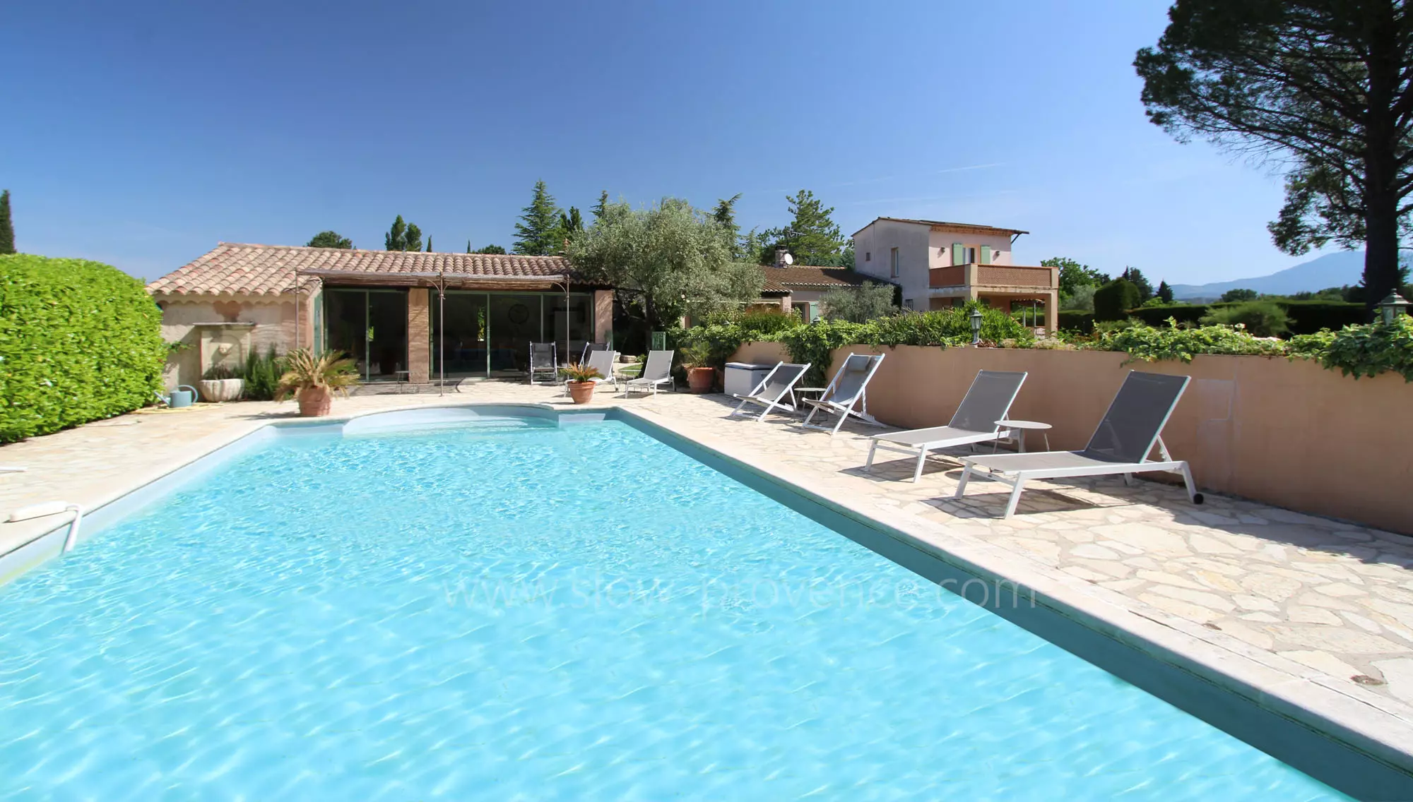 Swimming pool and its pool house