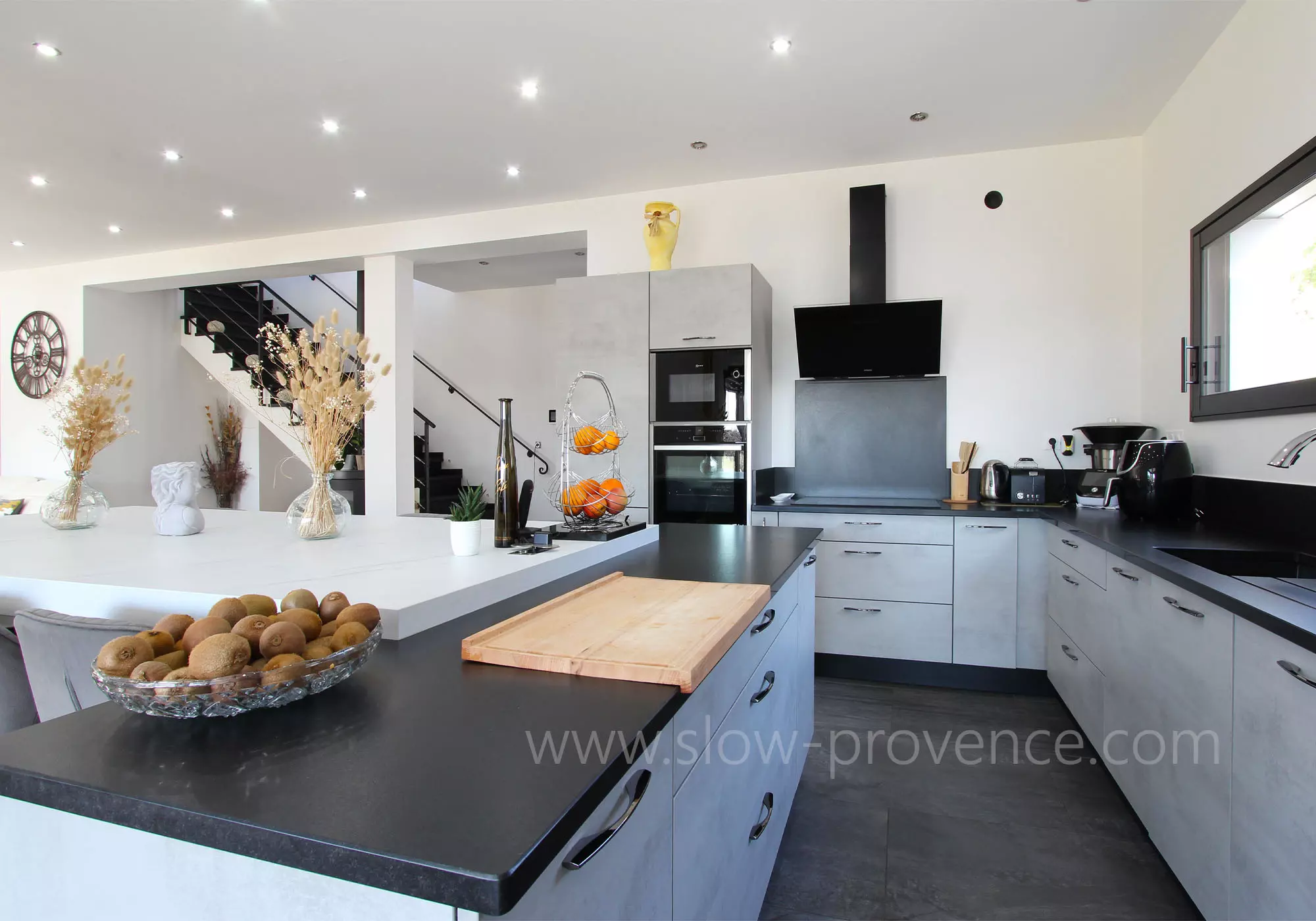 Spacious kitchen opening onto the living area