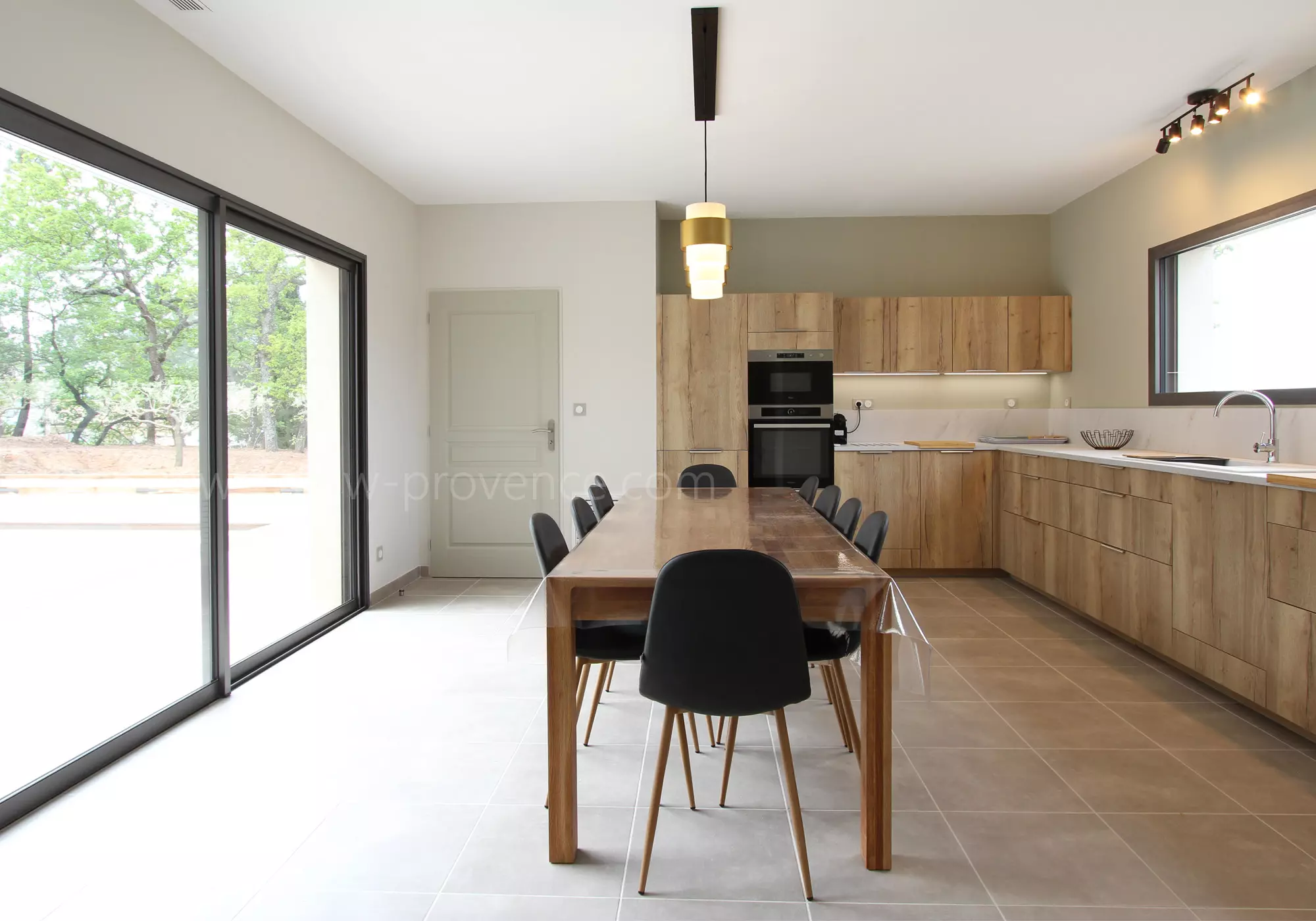 Kitchen and dining-room open onto the terrace