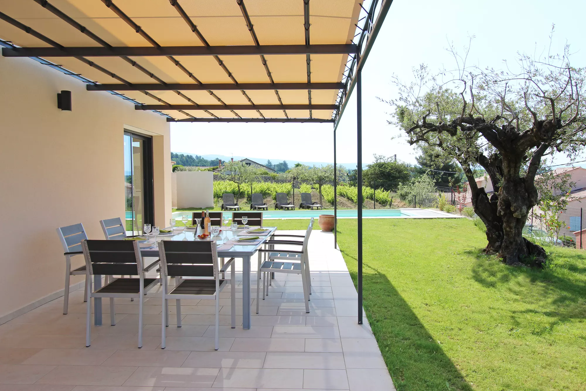 Terrace with a view over the pool