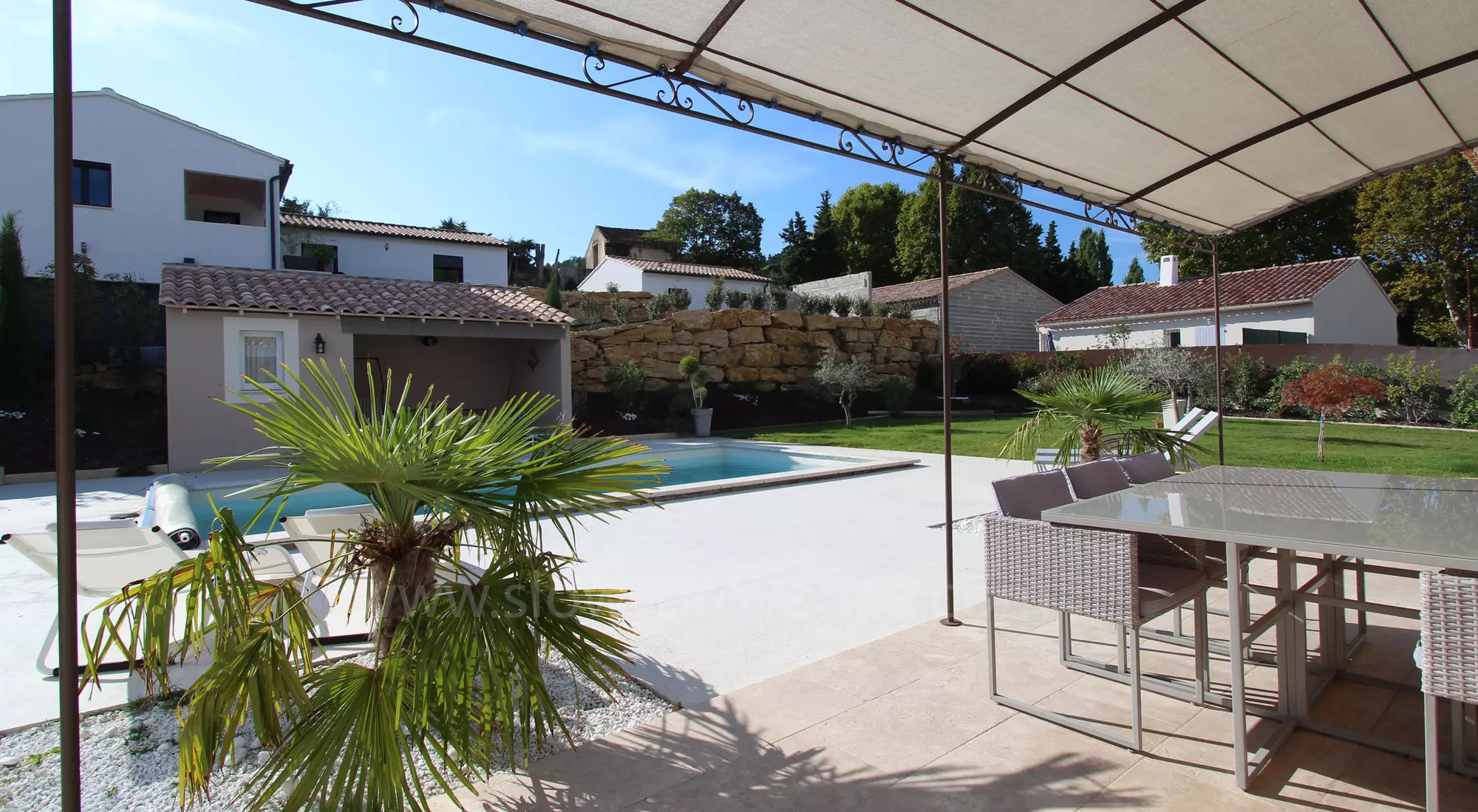 Shaded terrace with an arbour