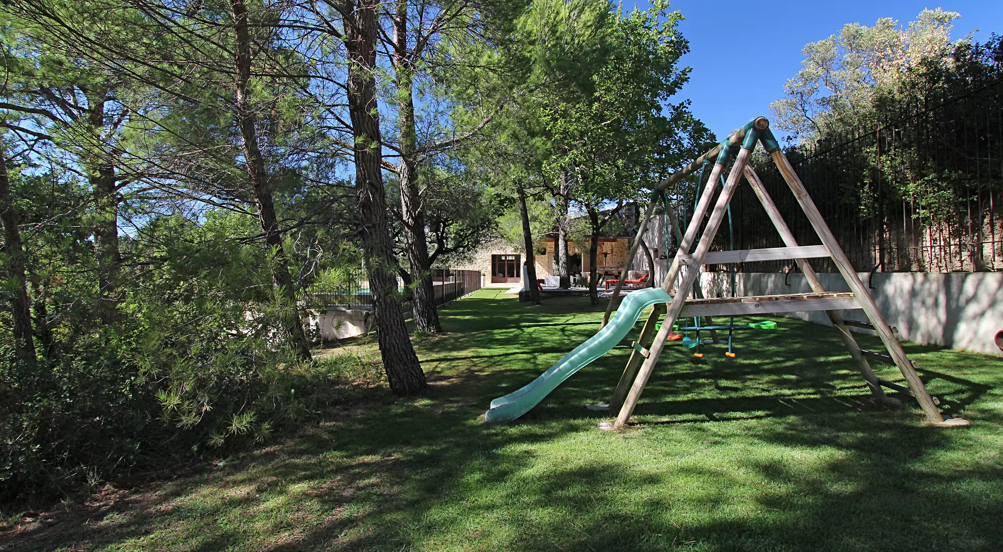 Chidren swings under the trees