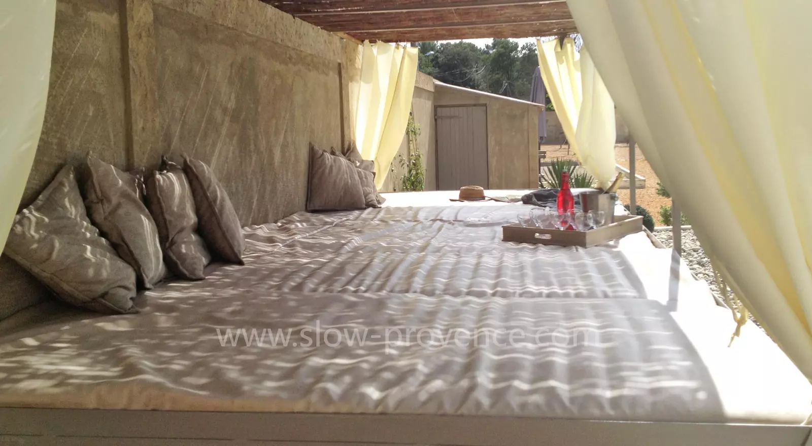 Canopy beds along the pool