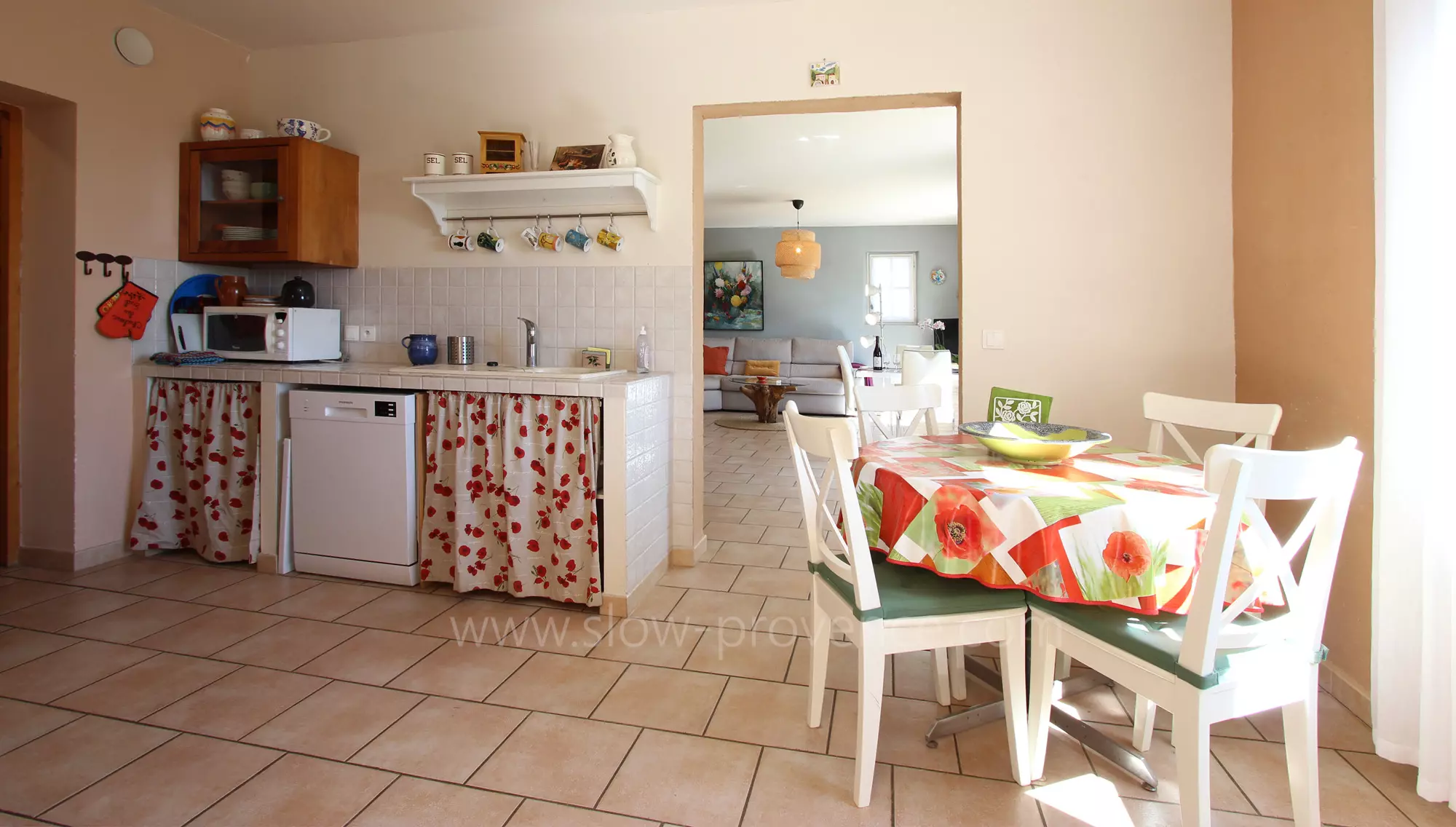 Kitchen with laundry room and access to the living room