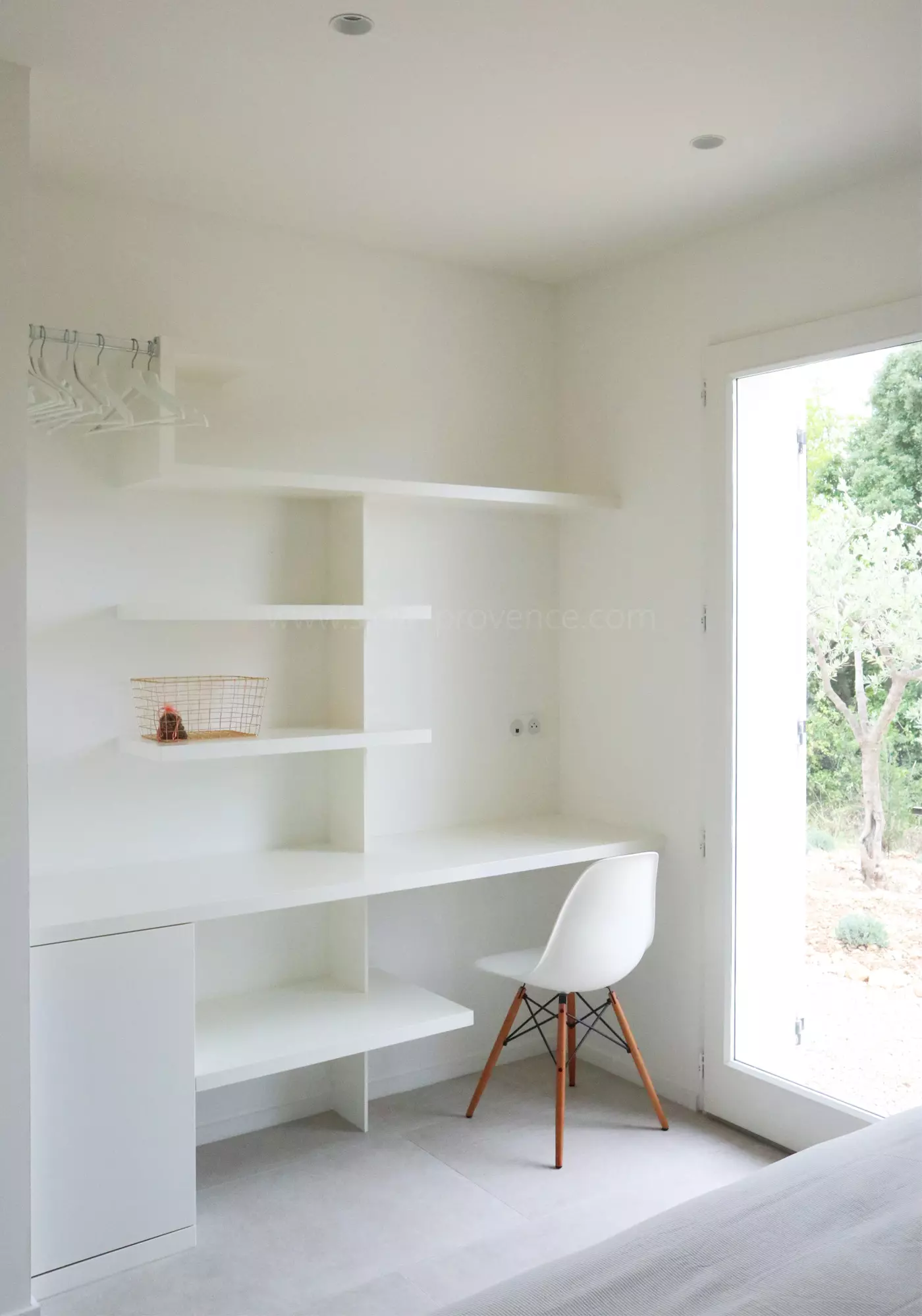 Open shelves and small desk in Bedroom 2