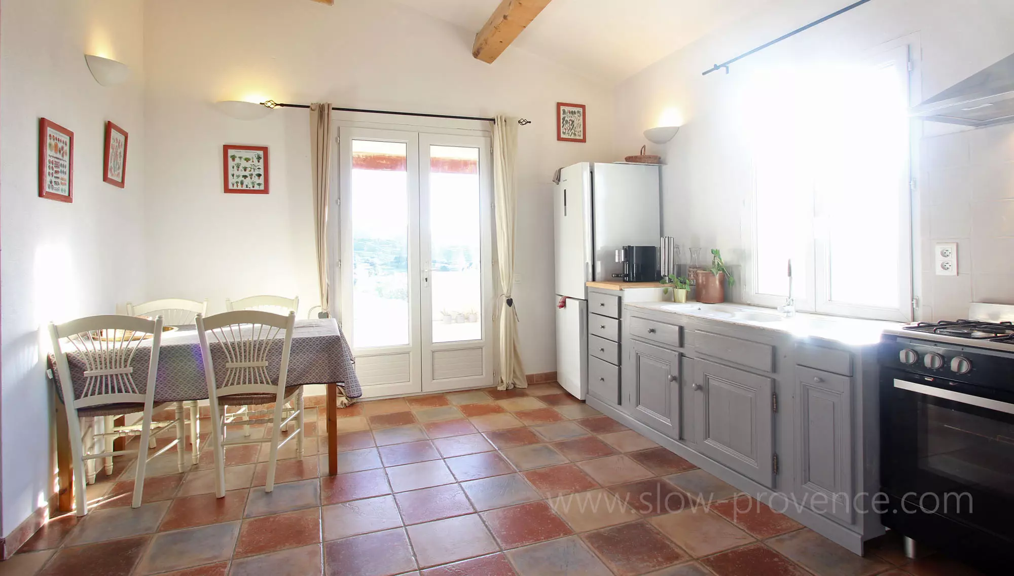 Kitchen opening onto the terrace